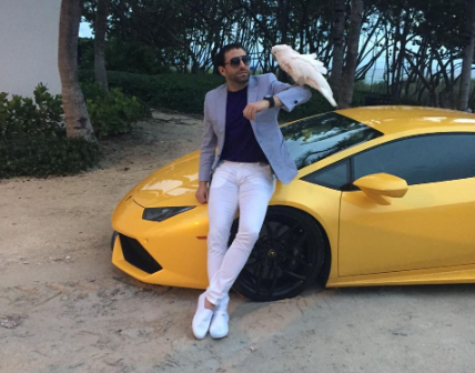 Michael Salzhauer standing beside his brand new Lamborghini.